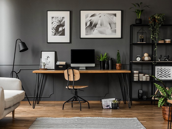 Large office with a modern style work station and lamp lighting.